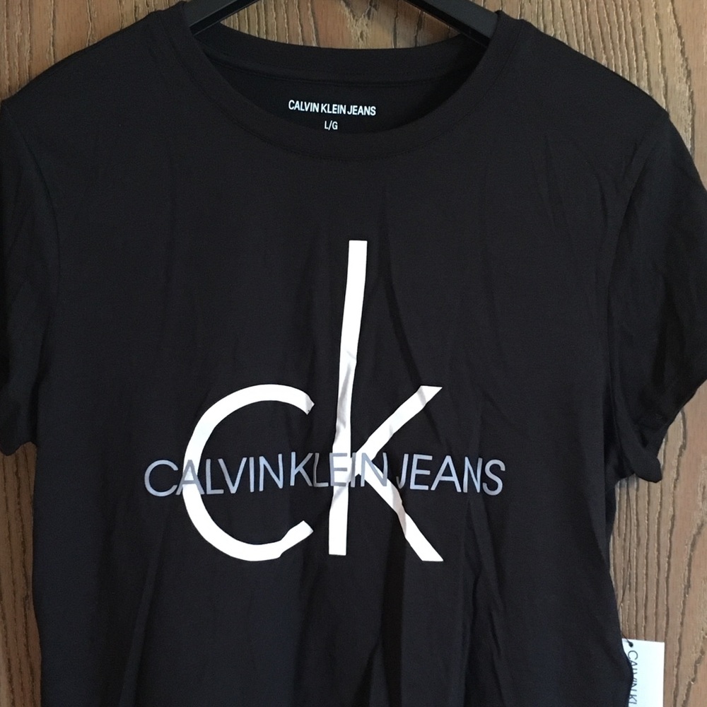 Calvin Klein cropped black top.